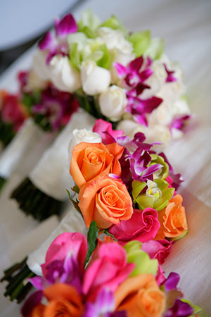 Wedding Bouquets in front of Vera Wang Wedding Dress