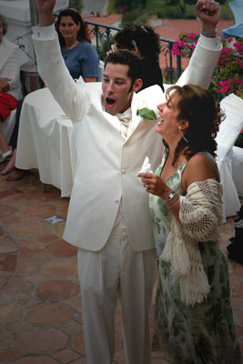 Malibu wedding mother and son celebrate at the reception.