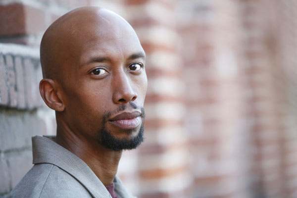 Headshot of actor/comedian in the Los Angeles area. Here he looks over at the camera in this color image.